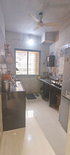 Kitchen in 1 BHK Apartment at Silicon Park, Malad West – for Sale