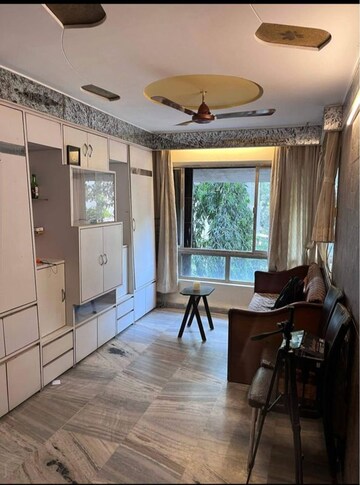 Living Room in 1 BHK Apartment at Tulip Apartment Santacruz West, Santacruz West – for Rent