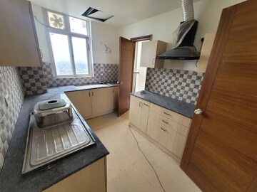 Kitchen in 2 BHK Apartment at 3C Lotus Boulevard, Sector 100 – for Rent