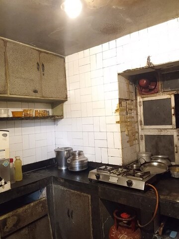 Kitchen in 2 BHK Apartment at Ballygunge – for Sale