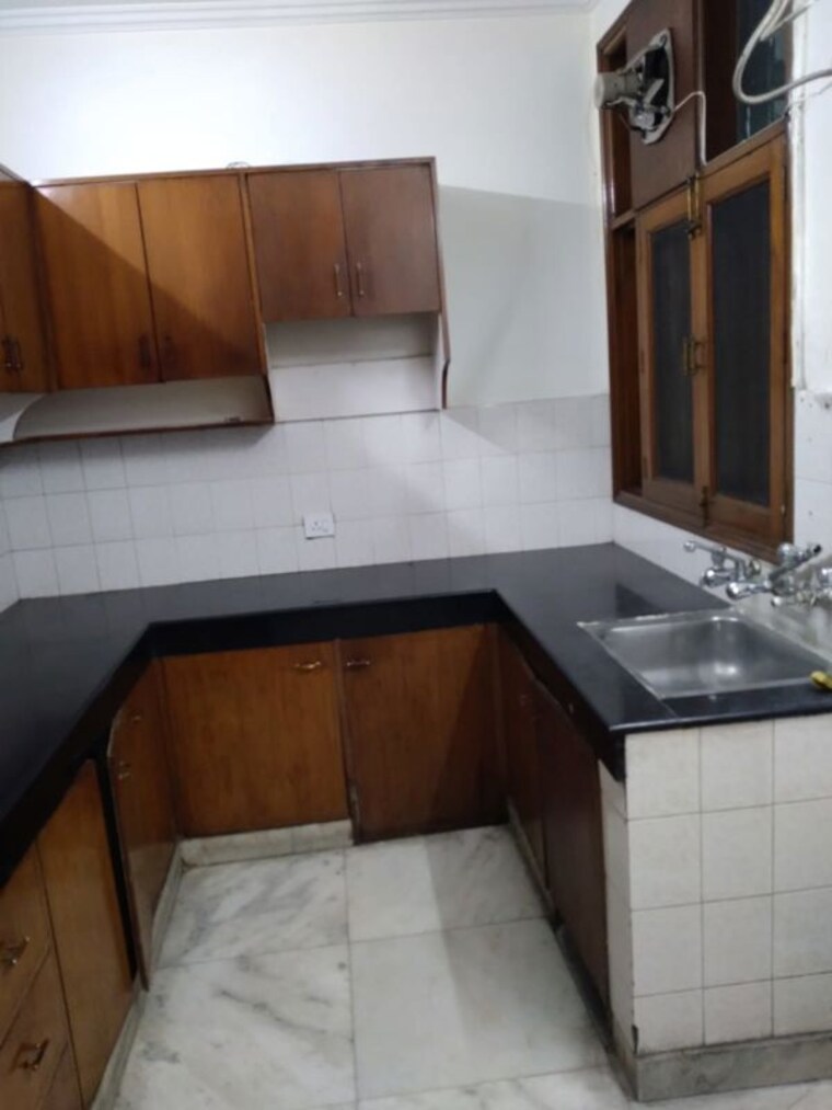 Kitchen, lajpat nagar 4 3 Bedroom 1700 Sq.Ft. Builder Floor In Lajpat Nagar 4 Delhi 10053892