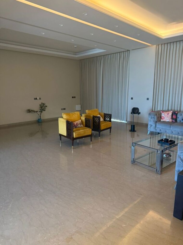 Living Room, jaypee-augusta-town-homes 4 Bedroom 4300 Sq.Ft. Villa In Sector 128 Noida 10054189