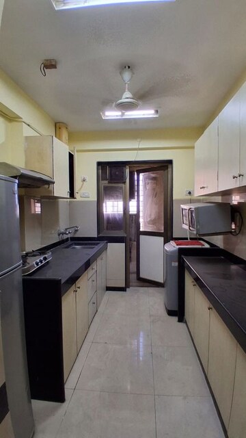 Kitchen in 3 BHK Apartment at Raheja Sherwood, Goregaon East – for Rent