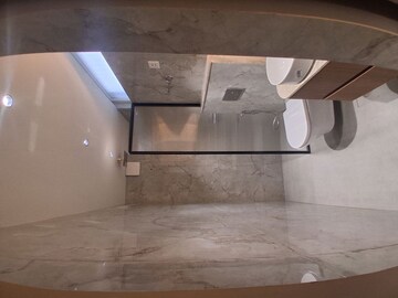 Bathroom in 4 BHK Apartment at DDA EWS Houses, Manglapuri – for Sale