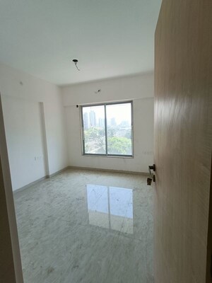 Room in 2 BHK Apartment at Parekh Celeste, Goregaon West – for Rent