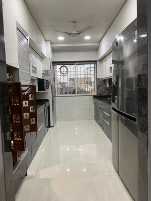 Kitchen in 3 BHK Apartment at Rajveer Apartment Andheri, Andheri West – for Rent