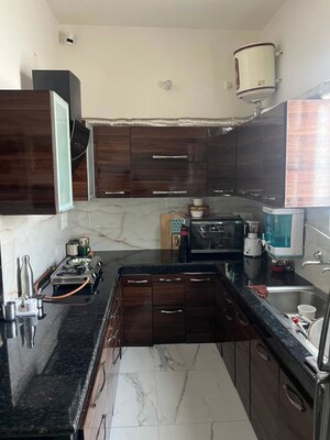 Kitchen in 4 BHK Builder Floor at Sector 27 – for Rent