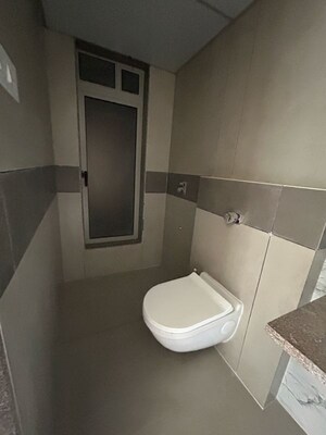 Bathroom in 2 BHK Apartment at Gurukrupa Marina Enclave, Jankalyan Nagar – for Sale