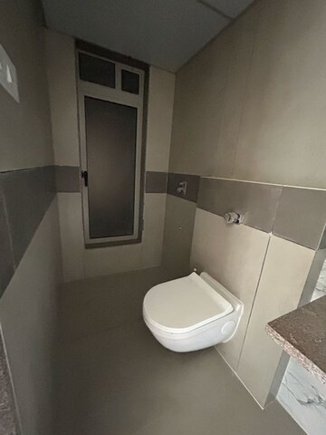 Bathroom in 2 BHK Apartment at Gurukrupa Marina Enclave, Jankalyan Nagar – for Sale