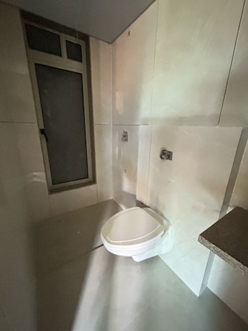 Bathroom in 2 BHK Apartment at Gurukrupa Marina Enclave, Jankalyan Nagar – for Sale