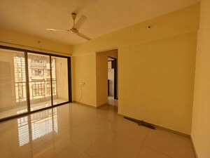 Room in 2 BHK Apartment at Om Prabhu Manohar CHS, Seawoods Sector 50 – for Rent