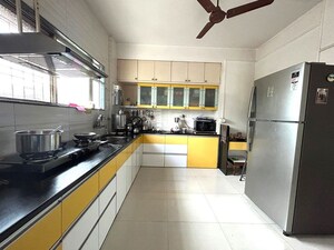 Kitchen in 2 BHK Apartment at Narayan Peth – for Sale