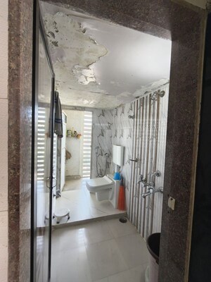Bathroom in 2 BHK Apartment at Shanti Dham Heights, Parsik – for Sale