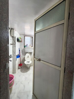 Bathroom in 2 BHK Apartment at Shanti Dham Heights, Parsik – for Sale