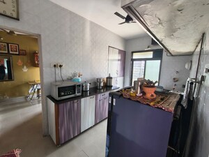 Kitchen in 2 BHK Apartment at Shanti Dham Heights, Parsik – for Sale