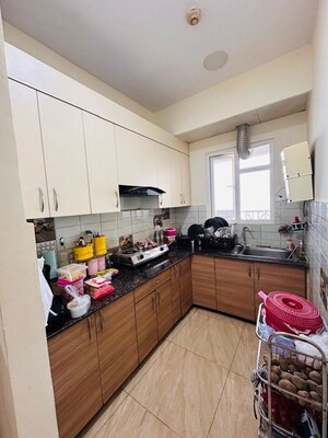 Kitchen in 3 BHK Apartment at VIctoryone Amara, Sector 16 Greater Noida – for Sale