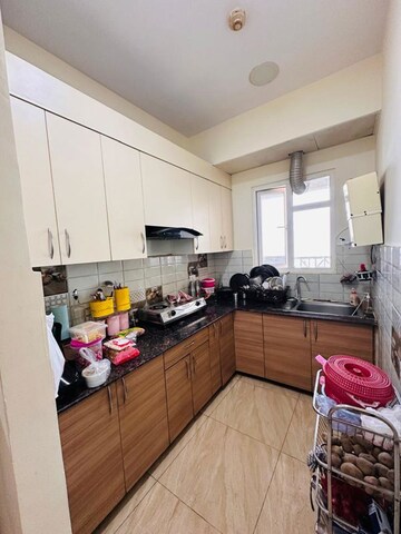 Kitchen in 3 BHK Apartment at VIctoryone Amara, Sector 16 Greater Noida – for Sale