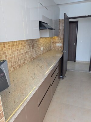Kitchen in 3 BHK Apartment at Umang Winter Hills Phase 2, Sector 77 – for Rent