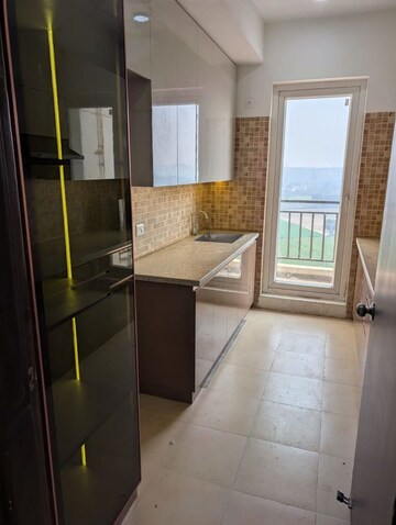 Kitchen in 3 BHK Apartment at Umang Winter Hills Phase 2, Sector 77 – for Rent