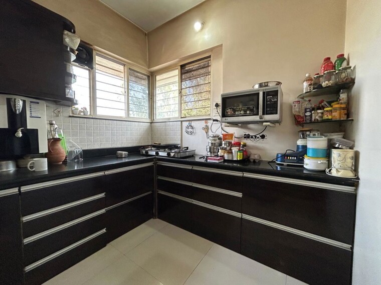 Kitchen, sun city 2 Bedroom 900 Sq.Ft. Apartment In Sun City Pune 10054660