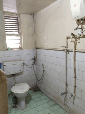 Bathroom in 2 BHK Apartment at Nina Apartments, Modi Colony – for Rent