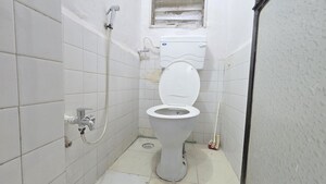 Bathroom in 1 BHK Apartment at Haridwar Apartments, Evershine Nagar – for Rent