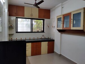 Kitchen in 2 BHK Apartment at Varanasi Society, Warje – for Rent