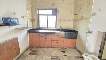 Kitchen in 1 BHK Apartment at Evershine Nagar – for Sale