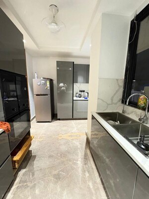 Kitchen in 4 BHK Builder Floor at Ashoka Cresent, Sector 26 – for Rent