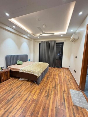 Bedroom in 4 BHK Builder Floor at Ashoka Cresent, Sector 26 – for Rent