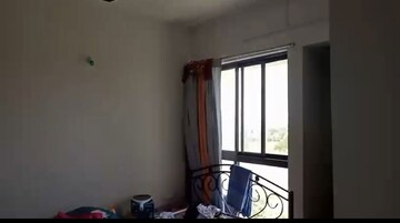 Living Room in 2 BHK Apartment at Lodha Lakeshore Greens, Dombivli East – for Sale