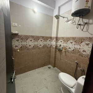 Bathroom in 1.5 BHK Builder Floor at Sector 63a – for Rent