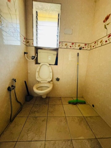 Bathroom in 3 BHK Apartment at Kendriya Vihar Seawoods, Seawoods West – for Rent