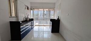 Kitchen in 2 BHK Apartment at Ravetkar Sukhniwas, Senapati Bapat Road – for Sale