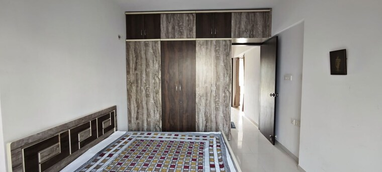Bedroom, ravetkar-sukhniwas 2.5 Bedroom 948 Sq.Ft. Apartment In Senapati Bapat Road Pune 9736046