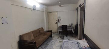 Living Room in 1 BHK Apartment at Tranquility Apartments, Andheri West – for Rent