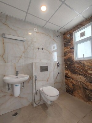 Bathroom in 2 BHK Apartment at Omaxe The Palace, Gomti Nagar – for Rent