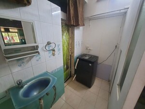 Bathroom in 2 BHK Apartment at Bindra Complex, Andheri East – for Rent