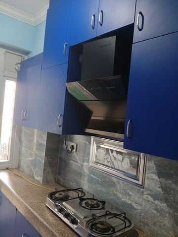 Kitchen in 2 BHK Apartment at Signature Orchard Avenue 2, Sector 93 – for Rent