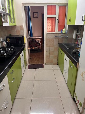 Kitchen in 3 BHK Apartment at Land Craft Golf Links Apartment Phase 2, Pandav Nagar – for Rent