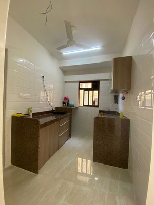 Kitchen in 2 BHK Apartment at Crescent Silverwoods, Powai – for Rent