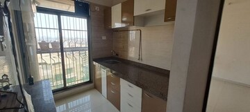 Kitchen in 1 BHK Apartment at Trident Woods, Katrap – for Rent