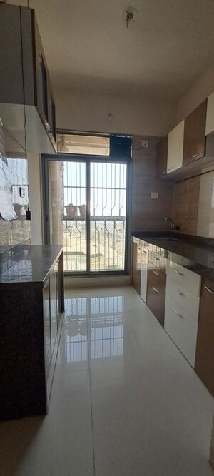 Kitchen in 1 BHK Apartment at Trident Woods, Katrap – for Rent