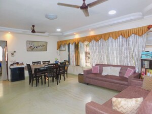 Living Room in 4 BHK Apartment at Malad West – for Sale