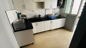 Kitchen in 2 BHK Apartment at Supertech Cape Town, Sector 74 – for Rent