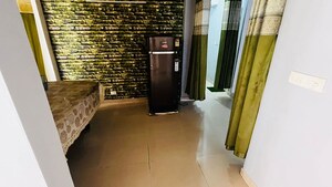 Living Room in 2 BHK Apartment at Supertech Cape Town, Sector 74 – for Rent