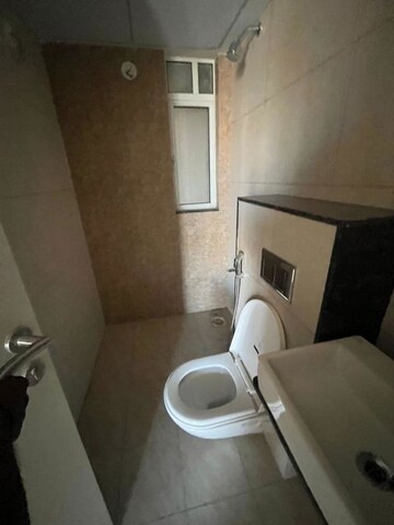 Bathroom in 2 BHK Apartment at Godrej Green Vistas, Mahalunge – for Rent