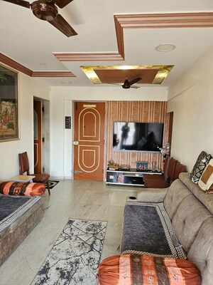 Living Room in 2 BHK Apartment at United CHS Malad, Malad West – for Sale