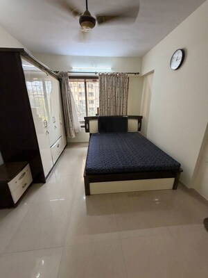 Bedroom in 3 BHK Apartment at Neelkanth Building, Chembur – for Rent