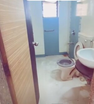 Bathroom in 2 BHK Apartment at Rutu Enclave, Kasarvadavali – for Sale